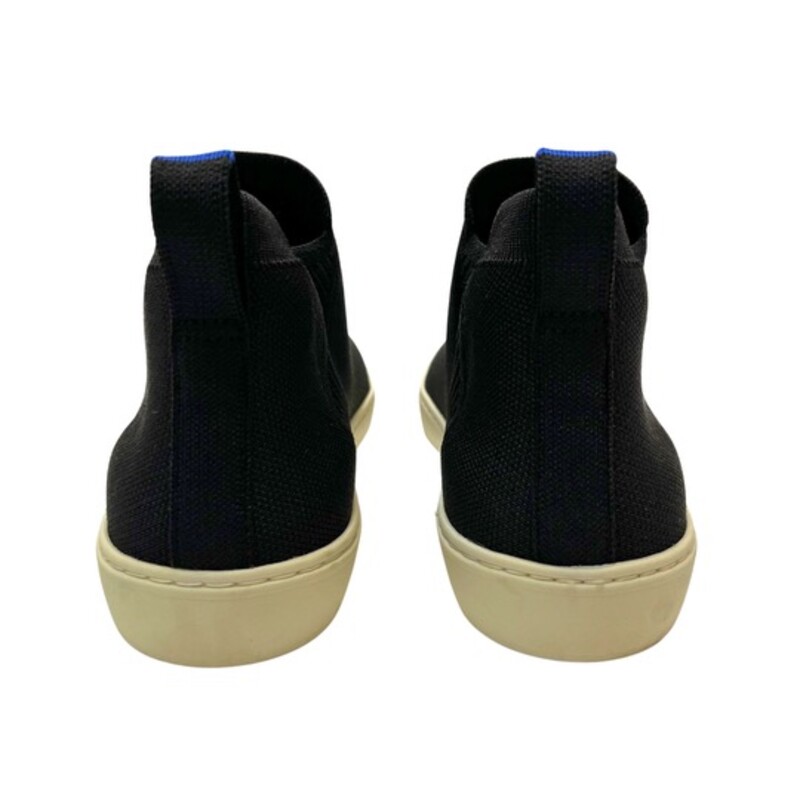 Rothys Chelsea Boot<br />
Rothy's 'The Chelsea' Boot Sneakers<br />
Black High Top Shoes<br />
Elevate your casual footwear collection with these stylish black knit pull-on Chelsea boots from Rothy's. These ankle-high sneakers feature a round toe shape and a comfortable flat heel height, pertect for all-day wear. The stretch upper material is both comfortable and durable, making these boots a long-lasting addition to your wardrobe.<br />
Size: 11