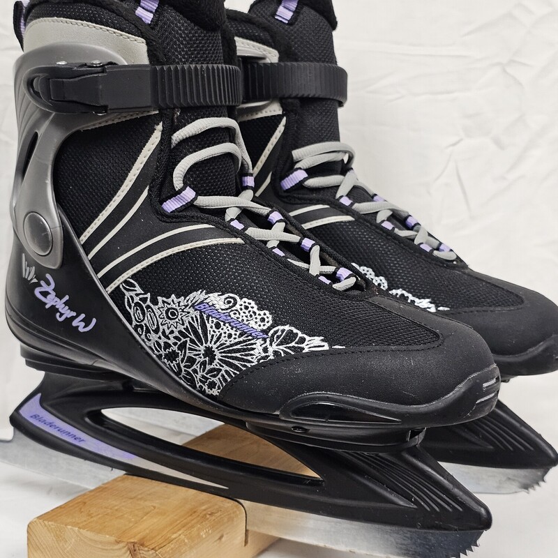 Bladerunner Zephyr W Women's Figure Skates
Size 9 Women's
Pre-Owned: Excellent Condition
Boot is in excellent condition.  No rips or tears on inner lining.  Only a couple small scuffs on out side of boot.
Blades are in excellent condition.  Straight, no gouges, and 11/16 inch of blade on rocker
