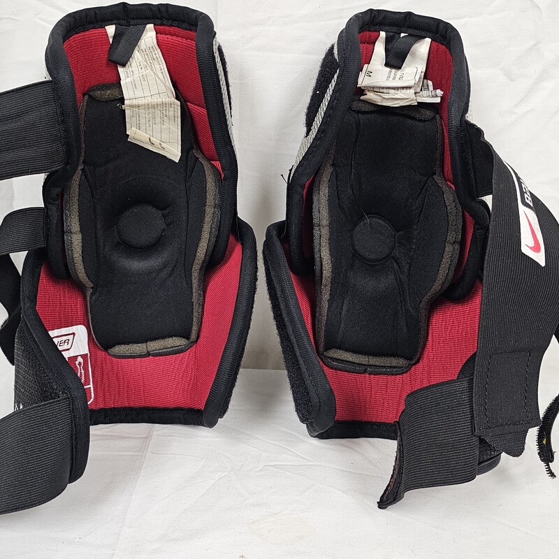 Nike Bauer Supreme 10 Elbow Pads
Size: Senior Medium
Pre-Owned: Excellent Condition
No rips, tears, or signs of wear.  Elastic straps are in excellent condition w/ no signs of being overstretched.  Velcro is in excellent working order.