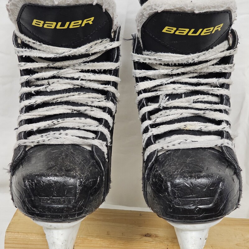 Bauer Supreme S140 Hockey Skates<br />
Size 2R<br />
Pre-Owned: Very Good Condition<br />
Boot is in great condition<br />
Blade holder is in good condition.  Scared up from regular use but in excellent working order.<br />
Blades are in very good shape.  Straight, no gouges, and 7/16 in of blade left on rocker.