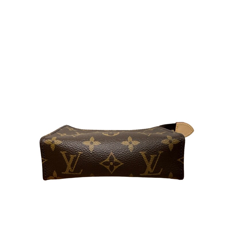 LOUIS VUITTON Monogram Toiletry Pouch 15. This cosmetics pouch is crafted of classic Louis Vuitton monogram coated canvas in brown. The pouch features a gold top zipper that opens to a dark pink leather-like interior.
Dimensions:

Length: 5.75 in
Height: 4 in
Width: 2 in