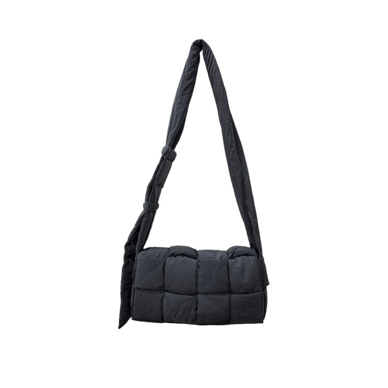 Bottega Venta Padded Tech Cassette Gray Crossbody<br />
<br />
Dimenions:<br />
12''W x 6''H x 3''W<br />
<br />
Note: Pouch not included inside.<br />
<br />
A quilted puffy fabrication gives a contemporary look to this convertible belt or crossbody bag.<br />
Foldover flap<br />
Interior zip pocket<br />
Quilted finish<br />
Nylon<br />
Made in Italy