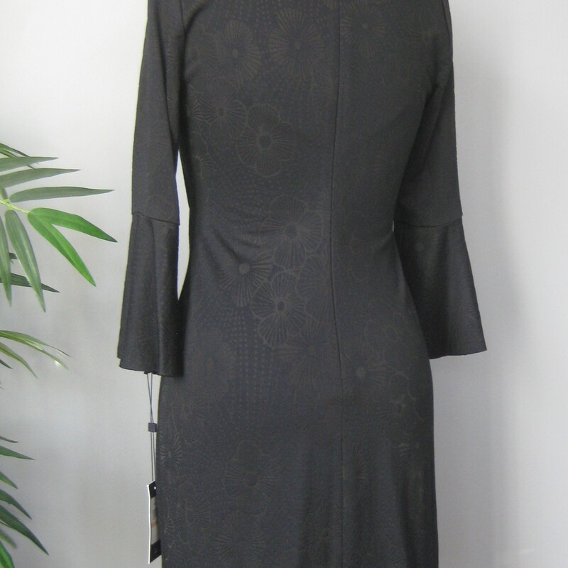 NWT Tommy Hilfiger Keyhol, Black, Size: 2<br />
Pretty LBD with simple lines and fun bell sleeves.<br />
Brand new with tags<br />
Size 2<br />
black knit brocade<br />
62% viscose, 20% nylon, 16% polyester, 2% spandex<br />
Keyhole neckline<br />
unlined<br />
here are the flat measurements:<br />
armpit to armpit; 16<br />
shoulder to shoulder: 13.75:<br />
waist: 14<br />
hip: 17<br />
length: 34.5<br />
<br />
Style No. A8HKICKA<br />
thanks for looking!<br />
#70679