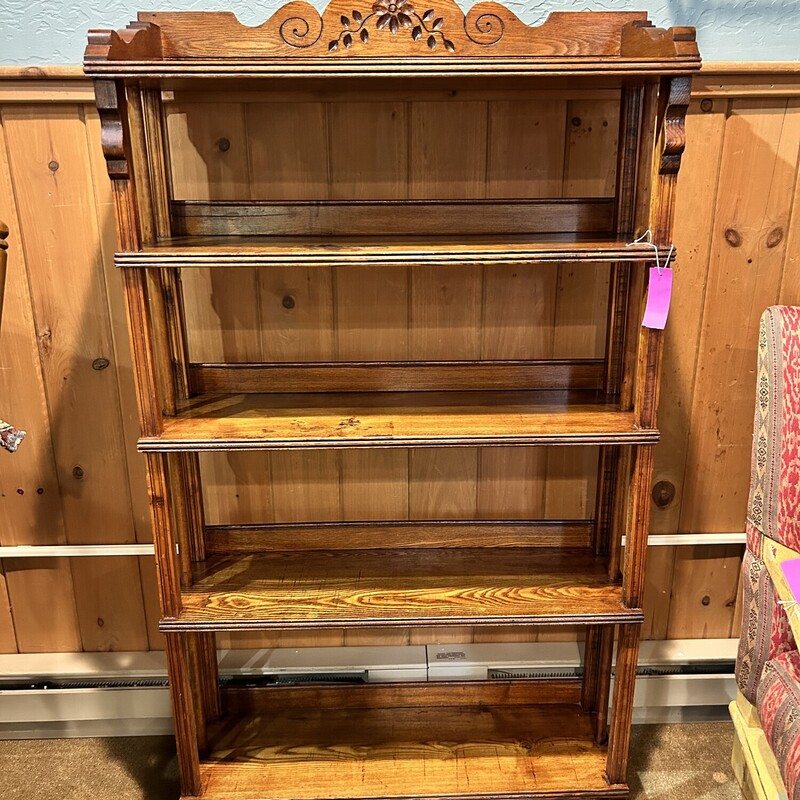Eastlake 5 Shelf
Size: 30x11x54
A wonderful example of Eastlake furniture from the late 1800s.  There are 5 shelves and a beautifully carved backboard on the top.  There are slats across the bottom back of each shelf to help contain your books or what ever you decide to display.  The side slats are fluted and there are spindles on each shelf which add to its beauty. This piece came from a local estate right here in Plymouth!