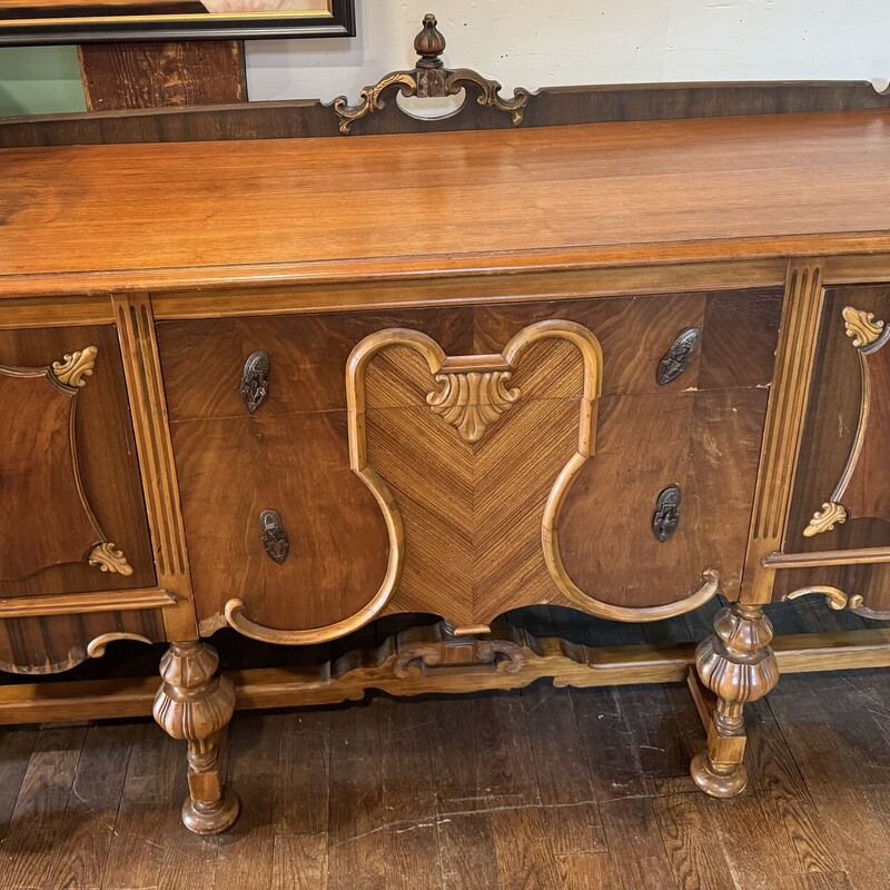 Vtg Buffet<br />
Two Tone, Unique Carvings<br />
Has Tow Different Backs That You Can Switch out<br />
66 Inches Wide, 22 Inches Deep 41 Inches High