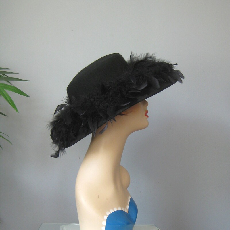 Vtg Belmart W Feathers, Black, Size: None<br />
This black feathered hat has a short crown and deep brim covered with black feathers.<br />
It's by Betmar and I believe it's from the 60s<br />
So Chic, dramatic and fun.<br />
The feathers are all firmly attached and beautifully glossy.  The inner hat band measures 21.5 around.<br />
Excellent condition, no flaws.<br />
thanks for looking<br />
#75020