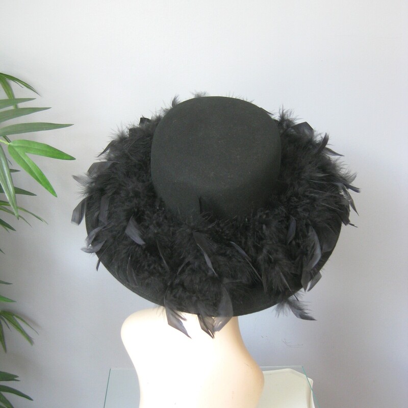 Vtg Belmart W Feathers, Black, Size: None
This black feathered hat has a short crown and deep brim covered with black feathers.
It's by Betmar and I believe it's from the 60s
So Chic, dramatic and fun.
The feathers are all firmly attached and beautifully glossy.  The inner hat band measures 21.5 around.
Excellent condition, no flaws.
thanks for looking
#75020