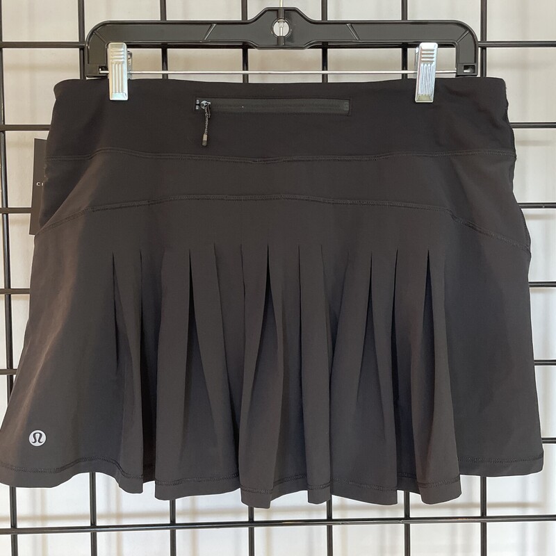 Lululemon Skort, Black, Size: 8 Tall
Acordian-Style Pleats
Lightweight, 4-Way Stretch
Sweat-Wicking, Quick-Drying
Added Lycra® fibre for stretch & shape retention
Pocket in liner holds tennis ball