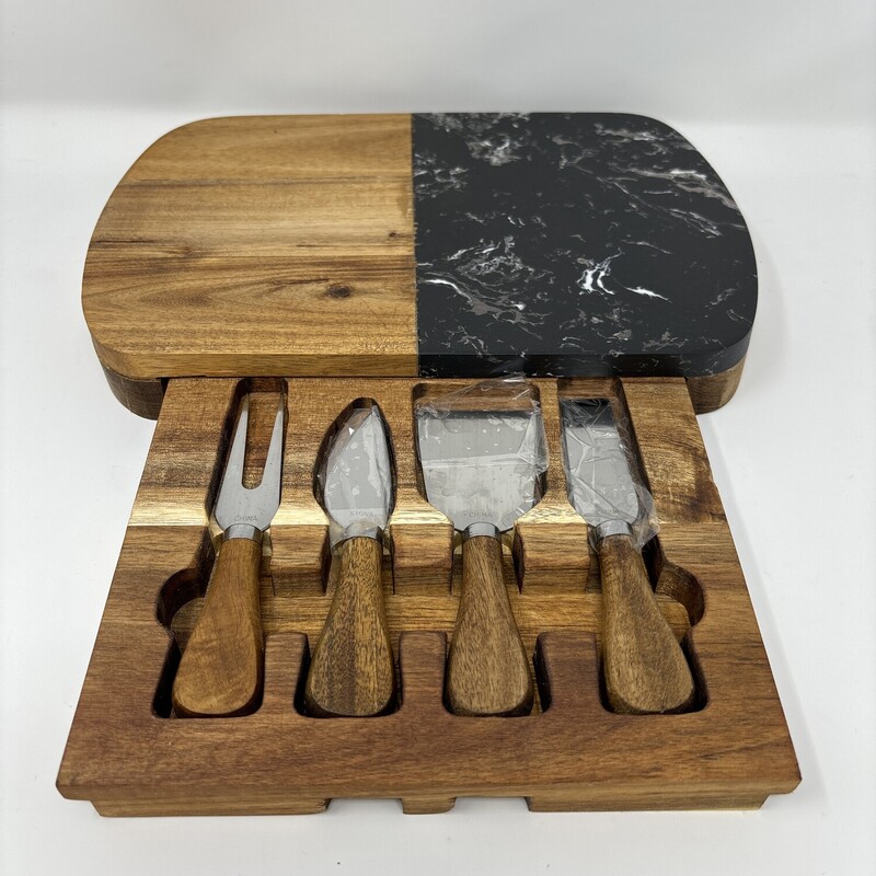 Cheeze Server
Wood and Marble
Includes four utensils