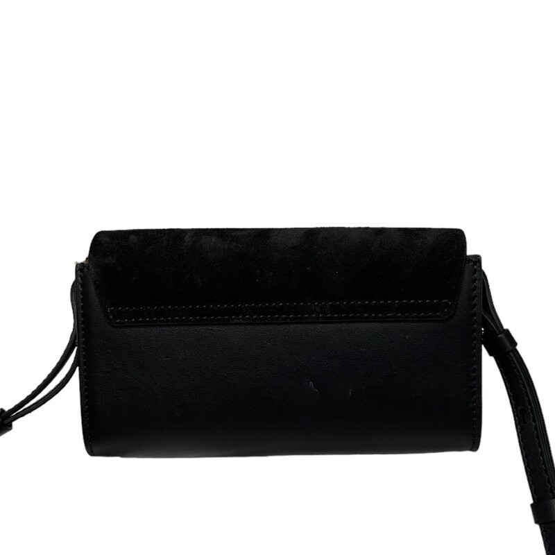 Chloe Faye Flap Bag<br />
Flap with snap closure<br />
3 Open compartments<br />
Adjustable leather strap<br />
Dustbag<br />
Imported from Italy<br />
<br />
Pockets:<br />
1 Slip pocket<br />
<br />
Material:<br />
Interior: Suede<br />
Exterior: Leather<br />
<br />
Dimensions:<br />
9.4” L x 3.5” W x 6.3” H; Weight: 1.8  lbs<br />
Long handle drop length: 20.1” - 22.4”