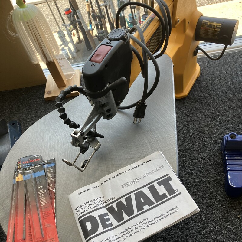 Scroll Saw, DeWalt, Size: 20in
DW788

The DEWALT 20 in. Variable-Speed Scroll Saw helps you create accurate, detailed workpieces. This professional scroll-saw has a user-friendly configuration with easily accessible controls, reduced vibration design, and variable-speed performance. The scroll saw features a double parallel-link arm design for accurate cuts, the arm pivots from the back to the front, shortening the distance the arm moves for smoother, quieter operation. It's easy to handle with variable-speed control for application-specific performance, the on/off switch, speed control, blade-tensioning lever, and flexible dust blower are all located within easy reach of the front upper arm. The dependable 1.3 Amp motor delivers 400 to 1750 SPM for plenty of power, while the compact design of this small scroll saw makes portability around your jobsite or workshop a breeze. Durable for years of reliable use, this DEWALT scroll saw has a cast iron table that bevels 45° to the left and 45° to the right for versatility and excellent support. The DEWALT DW788 Variable-Speed Scroll Saw is backed by a 3-year limited warranty for your added assurance.