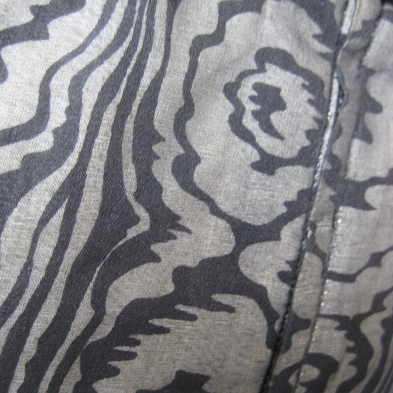 Vtg 50s Silk Print, Blk/gray, Size: Small<br />
Sophisticated cocktail dress from the 1950s.  This is a custom handmade dress.<br />
It was made from a black and white abstract swirl print cotton or cotton silk blend overlain with sheer black organza.  Fitted and offering high end dressmaker details like a waist and bra bra stays and bound armholes.  It also has a deep hem, 4 1/8, this deep hem provides stability and a bit of weight at the bottom, not that this dress is liable to fly up in any wind, it's too fitted for that!<br />
<br />
Center back black metal zipper.<br />
beautifully fringed attached satin belt.<br />
<br />
This dress fits my size 4 mannequin perfectly but without a lot of room to spare.<br />
Here are the flat meausurements:<br />
armpit to armpit: 18.5<br />
waist: 13<br />
hip: 18.75<br />
length: 38<br />
<br />
Excellent condition, no flaws.<br />
thanks for looking!<br />
#70432