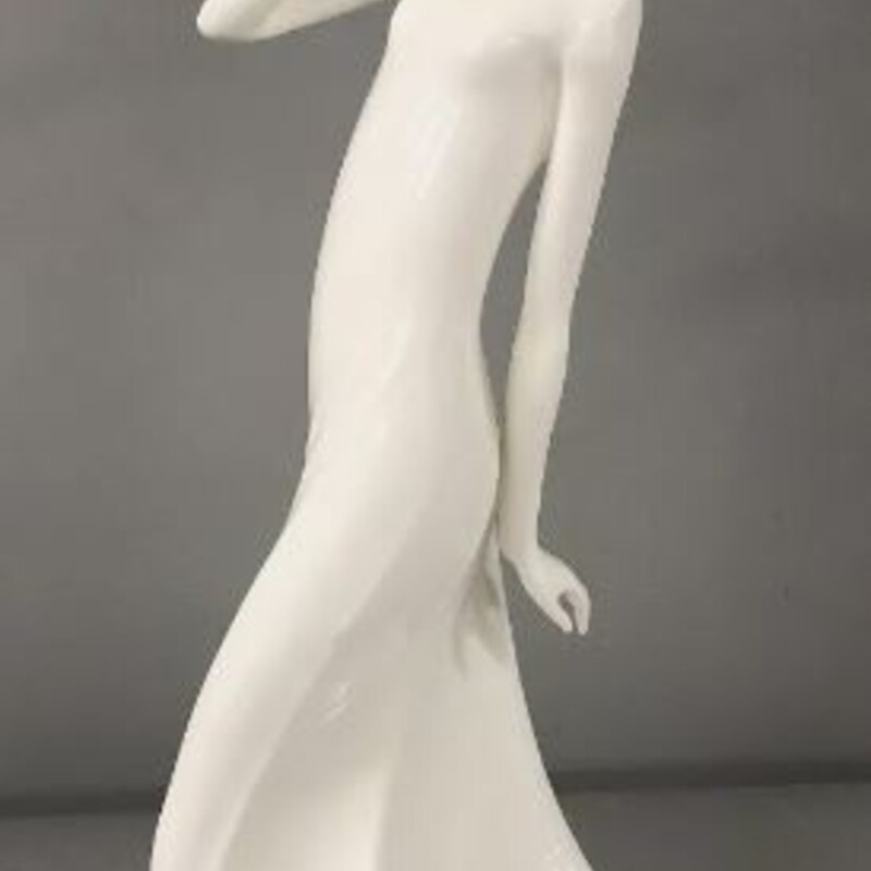 Royal Doulton Carefree Woman Figurine
White
Size: 6x12H