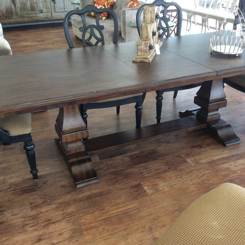 You will love this Klaussner Diningroom table, beautiful brown finish with heavy distressing and burnishing which creates an uneven relaxed appearance, large carved legs and one leaf.   Size: 84x42x31