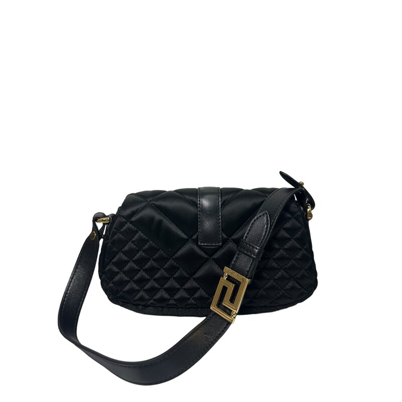 The Greca Goddess line is characterized by the central Greca chain hardware. Crafted in Italy from quilted satin, it features a spacious interior with an additional slip compartment. A leather strap can be adjusted for shoulder or hand-carry options.
Greca hardware
Detachable and adjustable leather shoulder strap
Magnetic snap button closure
Foldover flap
Internal slip compartment
Outer composition: 72% Viscose, 28% Silk
Trim: 100% Lambskin

Dimensions:  3.9H x 8.2W x 1.8D