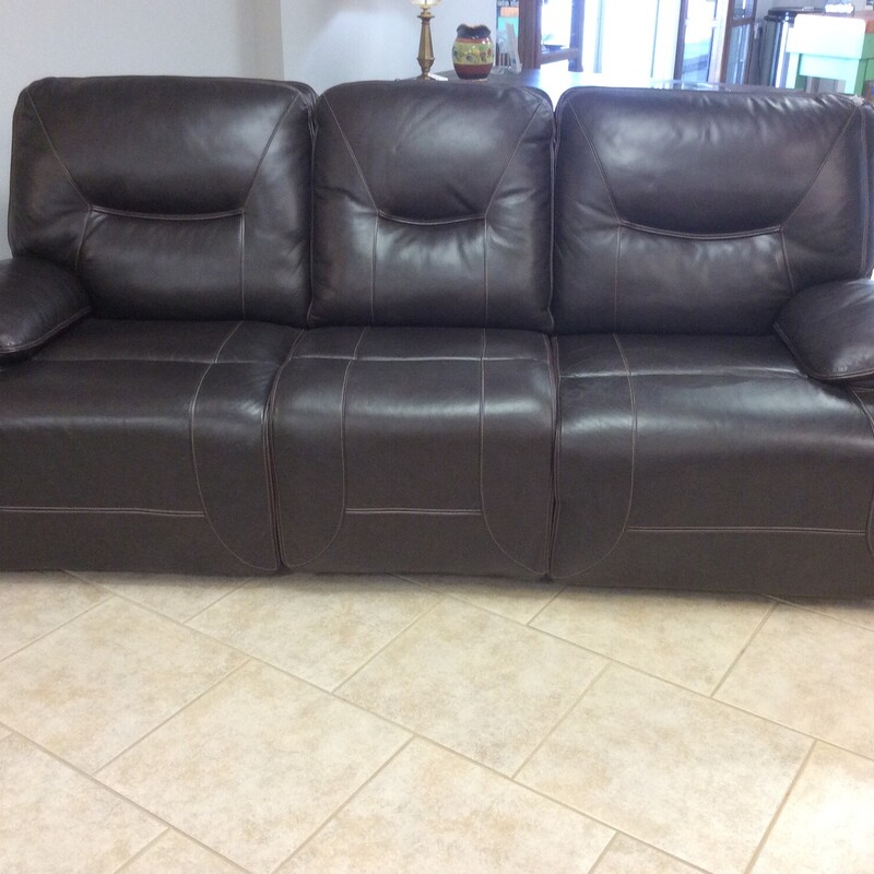 Dark brown leather electric reclining sofa.  With the option to fold down the middle seat to make room for refrechments.  Size: 95