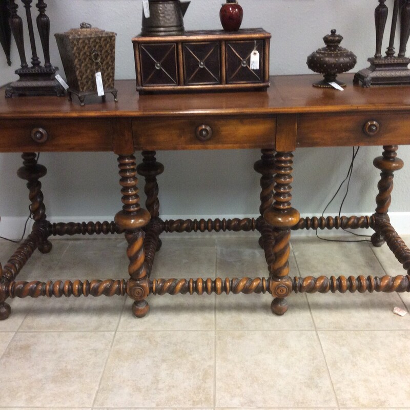 This leather topped console table is a stunner! Large,  needs the appropriate sized room. The attention to detail and quality of craftsmanship is obvious.  Size: 78x29.5x36