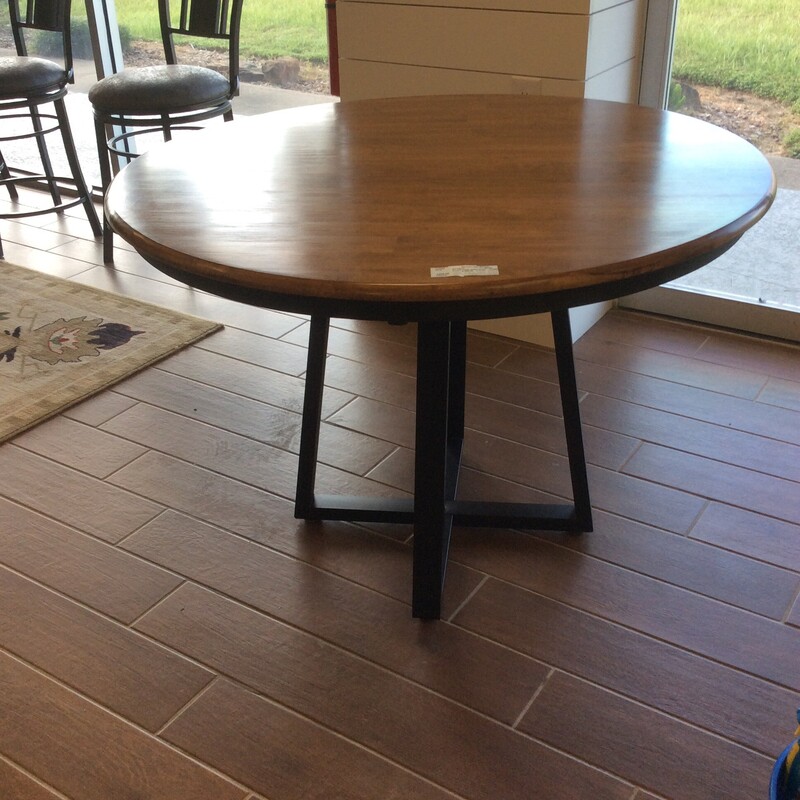 Wonderfully bold and rustic, the round dining table would be a fabulous centerpiece for any room.  Size: 42 RND X 30