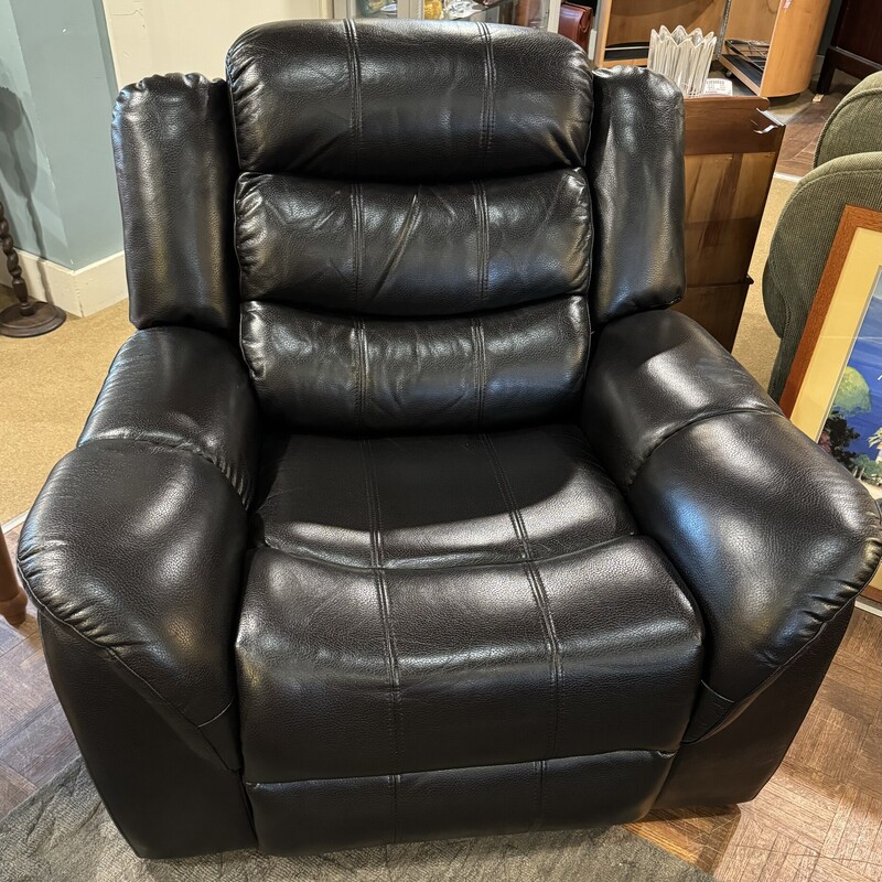 Black Leather Recliner
Great Condition, Rocks as Well
48 Inches Wide, 38 Inches Deep, 38 Inches High