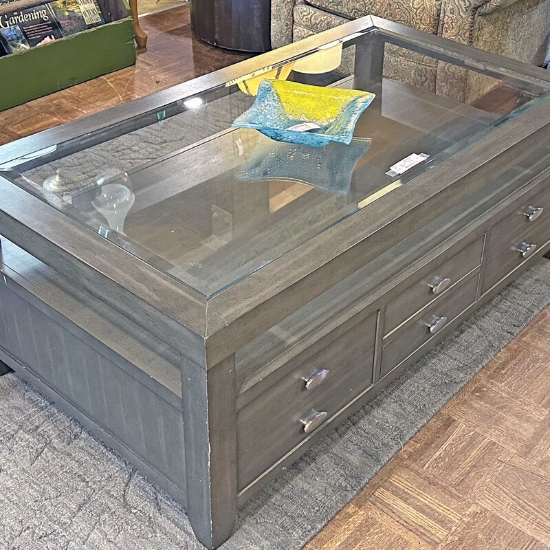 Glass Top Coffee Table
50 In Wide x 28 In Deep x 19 In Tall.