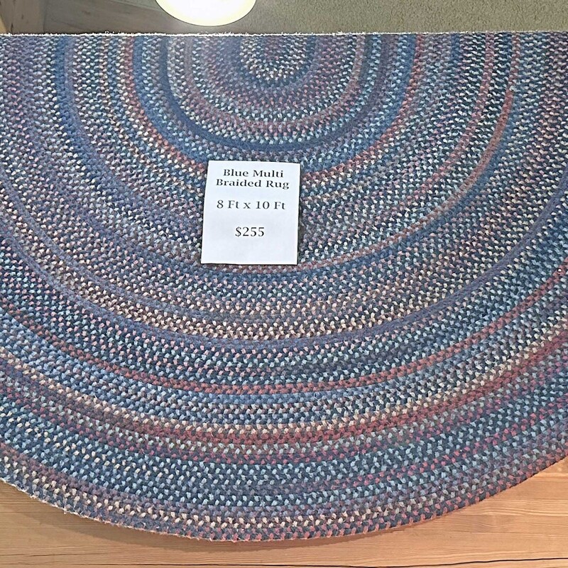 Blue Multi Braided Rug
This rug is in good shape, however,
it does have pills on it.  Something that can
be removed if it bothers you.
8 Ft x 10 Ft.