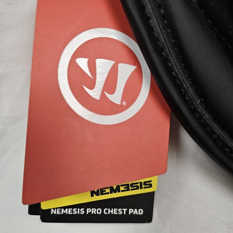 New with tags Warrior Nemesis Pro Lacrosse Goalie Chest Pad, NOCSAE Certified, Size: Small
FEATURES:
-NOCSAE Impact standard approved Impax foam chest plate with inserts provide enhanced impact absorption at high and low speeds
-3-Piece chest pad construction allows for improved flexibility when crossing arms over for off-stick shots
-Adjustable fit system allows you to build up or bread down your belly pad setup, provides maximum protection or increased mobility
-Adjustable straps system for perfect fit and comfort
Size Small fits players:
Chest          36in - 40in,
Height	4ft 7in - 5ft 4in
Weight	70 - 110 lbs.
Age	10 - 12