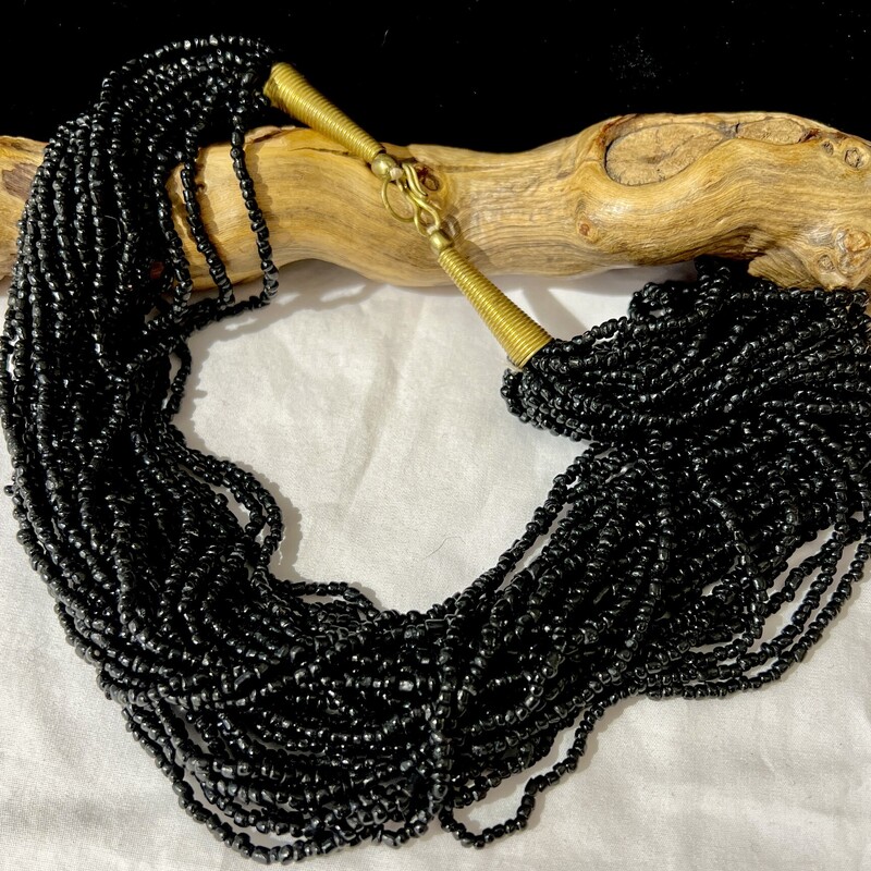 Multistrand black bead necklace