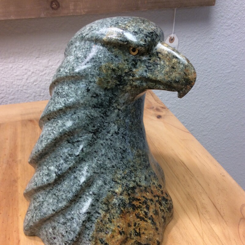 This majestic Eagle Head sculpture is carved out of solid green granite.