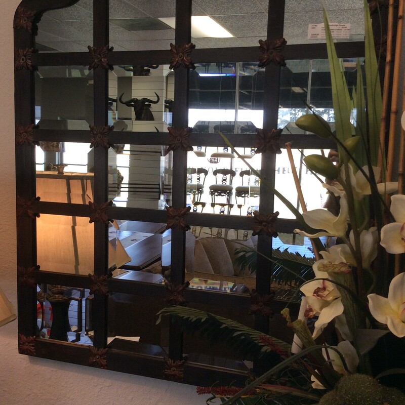 This pair of Uttermost Mirrors have wooden dividers with individual beveled mirror insets and metal medallion accents.