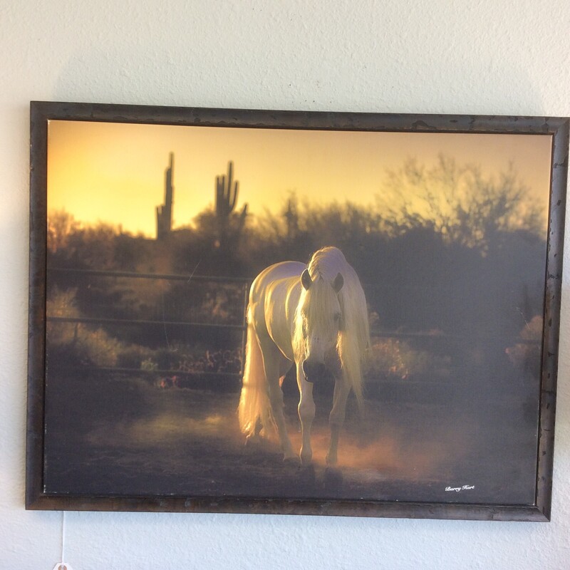 This Horse On Canvas photo print has a rustic wood frame.