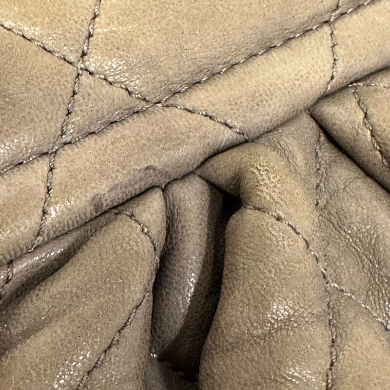 Chanel Washed Quilted, Taupe, Size: Large<br />
<br />
Dimensions:<br />
Length: 13.5 in<br />
Width: 3 in<br />
Height: 11 in<br />
Drop: 23.5 in<br />
<br />
Date Code: 14121849<br />
<br />
Note: Wear to lambskin around corners.