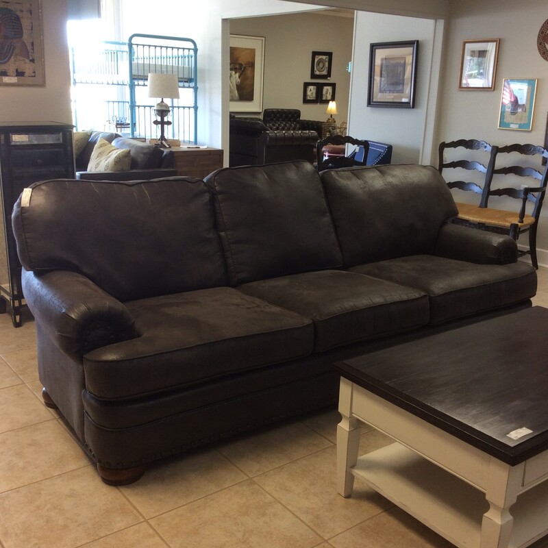 This is a stunning leather sofa from Mayo Furniture. Dark brown, slightly overstuffed with a soft and supple leather.