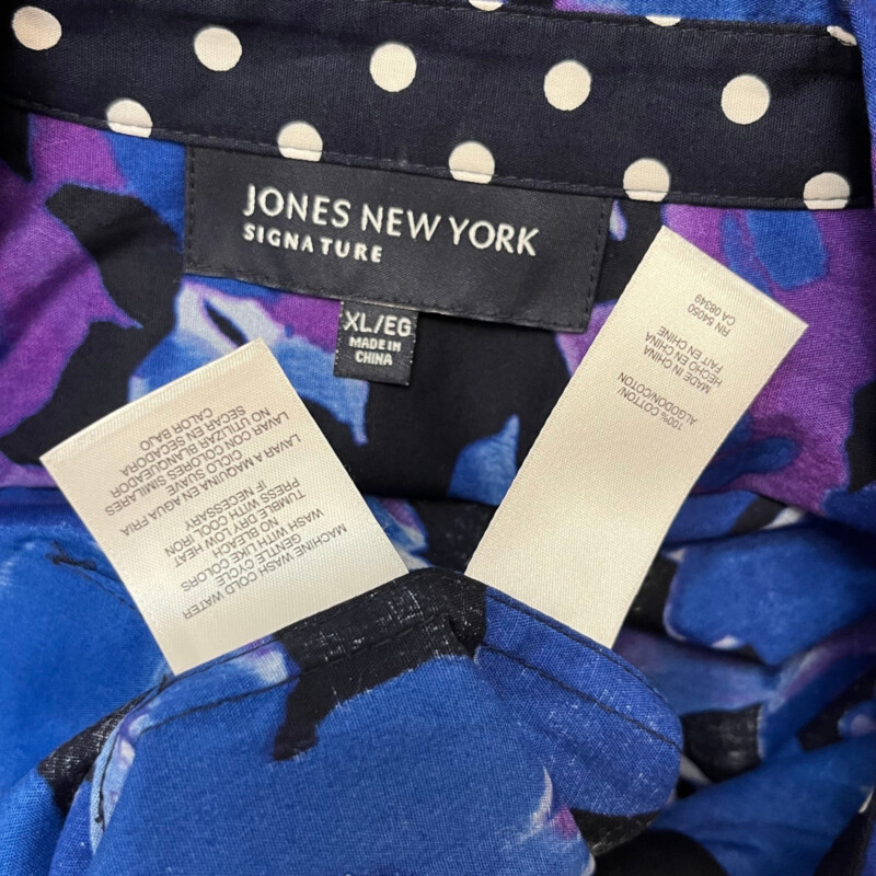 Jones NY Floral Shirt<br />
100% Cotton<br />
Collar and Reverse Side of Sleeves have Adorable PolkaDots<br />
Blues and Purples<br />
Size: XL