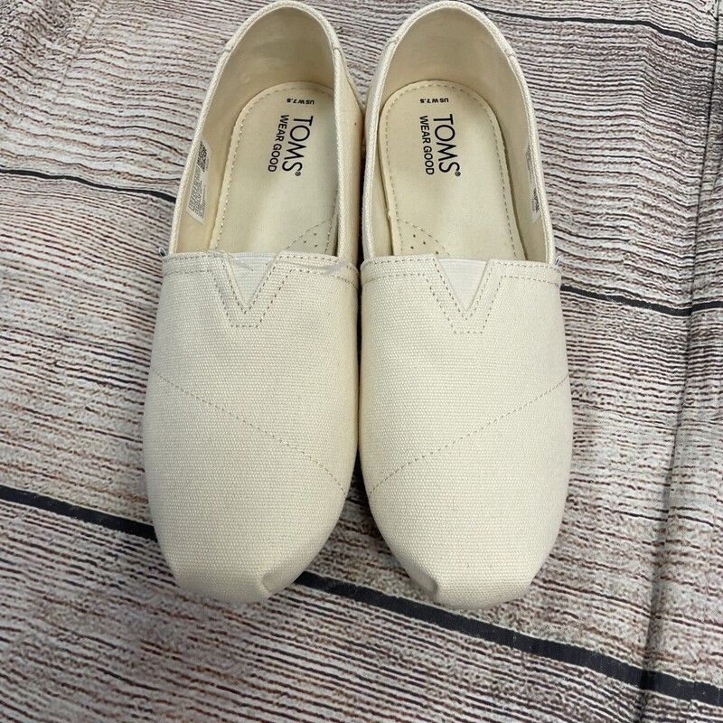 Toms Cream slip on shoes never been worn size 7.5