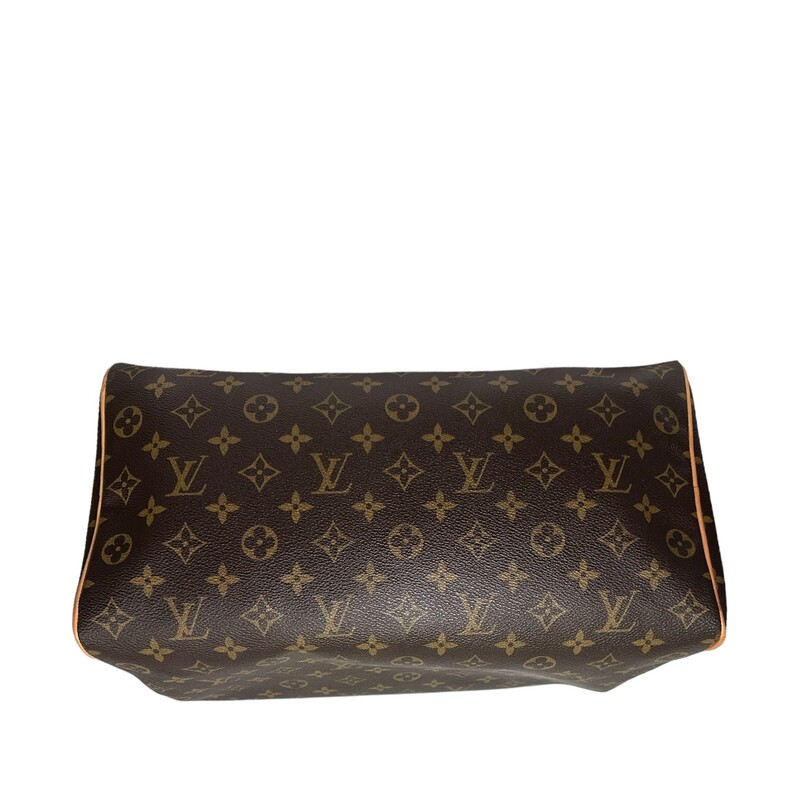 Louis Vuitton Speedy 35
Monogram Printed Coated Canvas
Comes with Louis Vuitton dust bag
Comes with lock, but no key

Production Year: 2008
Date Code: SD0058

Dimensions:
Height 9 inches
Width 14 inches
Depth 7.25 inches
Handle Drop Length 4 inches