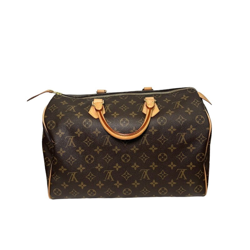 Louis Vuitton Speedy 35
Monogram Printed Coated Canvas
Comes with Louis Vuitton dust bag
Comes with lock, but no key

Production Year: 2008
Date Code: SD0058

Dimensions:
Height 9 inches
Width 14 inches
Depth 7.25 inches
Handle Drop Length 4 inches