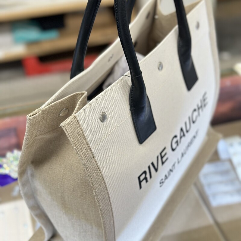 YVES SAINT LAURENT Logo Canvas Tote, completely unused and brand new! Pristine condition and includes original dust bag. Retails for $1,890 on YSL website.
Size: 16x7x12