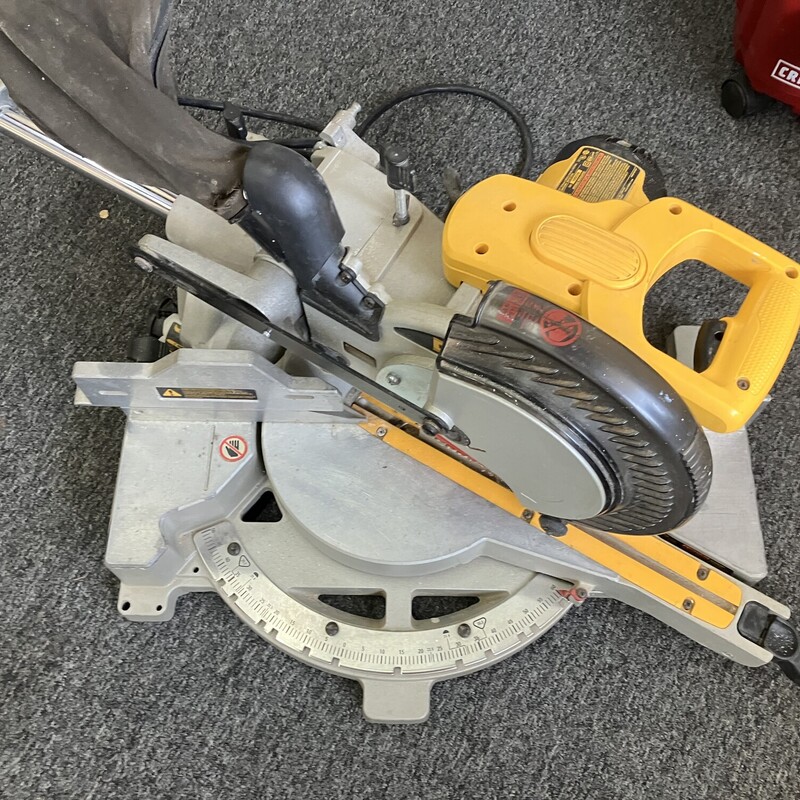Sliding Compound Miter Saw, Size:8-1/4in  DeWalt DW712

The DEWALT® Heavy-Duty Sliding Compound Miter Saw has a powerful 15 Amp motor that delivers 5400 RPM with extended durability and strength. The DW712 cuts a 3in. post with a single pass and easily trims 3 1/2in. crown molding vertically, due to the taller fence. This miter saw has all the features of the bigger, high-end saws, and more.