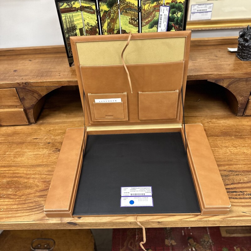 Levenger Leather Portable Desk/Surface, Caramel Brown. In excellent condition/barely used.
Size: 18x12x2