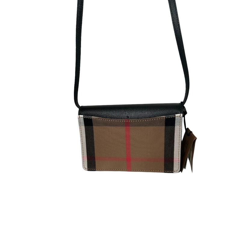 Burberry Hampshire Derby New With Tags<br />
Measurements: 7.5 L x 1.5 W x 5.15 H<br />
Interior Pockets: Six card slots, two flat pockets and one zip pocket<br />
Exterior Pockets: One rear flat pocket<br />
Handles: Single flat adjustable leather shoulder strap<br />
Handle Drop: 21 adjustable<br />
Closure/Opening: Flap top with magnetic snap closure<br />
Interior Lining: Leather lining<br />
Hardware: Goldtone