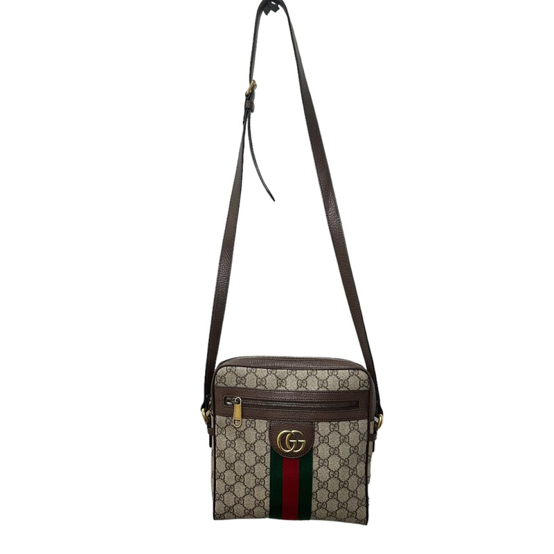 Gucci  Ophidia
Beige/ebony GG Supreme canvas, with brown leather trim
Green and red Web
Antique gold-toned hardware
Interior open pocket
Double G
Front zipper pocket
Interior zipper pocket
Adjustable leather shoulder strap with 21.5 drop
Zipper closure
Small size: 9W x 9.5H x 2D
Made in Italy