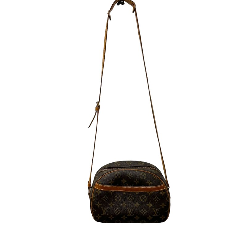 LOUIS VUITTON Monogram Blois. This stylish crossbody is crafted of traditional Louis Vuitton monogram on toile coated canvas in a feminine oval silhouette. The shoulder bag features a lengthy vachetta cowhide leather shoulder strap with brass hardware and a full wide facing pocket with a vachetta trim. The top zipper opens to a spacious terra-cotta cross-grained leather interior with a patch pocket.
Dimensions:
Length: 9.5 in
Height: 7 in
Width: 4.5 in
Drop: 16 in