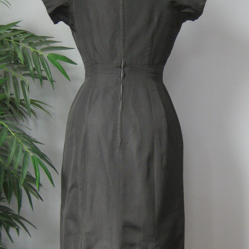 Simple black silk sheath dress from the 1950s<br />
No tags.<br />
unlined<br />
Center back metal zipper<br />
Perfect wardrobe builder, this classic little black dress will easily take you from work to evening to weekend by changing up the shoes and jewelry..<br />
<br />
NO size tags, fits my size 4 mannequin well.<br />
Pls use flat measurements below:<br />
Armpit to Armpit: 18.5<br />
Waist: 14<br />
Hips: 19<br />
Overall Length: 40<br />
<br />
Thank you for looking<br />
#70431