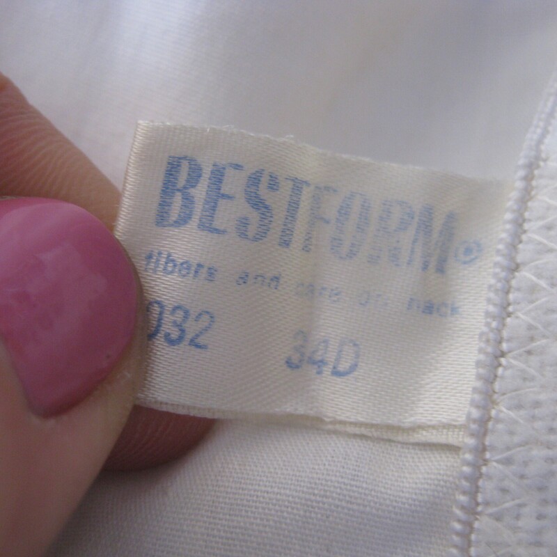 Full coverage vintage bra by Best Form<br />
Great condition, with minor signs of uneven color<br />
It's made of a cotton or cotton like panels and elastic connective areas which have plenty of stretch left.  it has slidable little pads on each strap.<br />
marked size 34Dm - it's quite tight on my size 4 mannequin<br />
two rows of hooks in the back, shown on larger setting<br />
The band measures only 26 from end to end, stretches comfortable to about 29<br />
<br />
thanks for looking!<br />
#70424