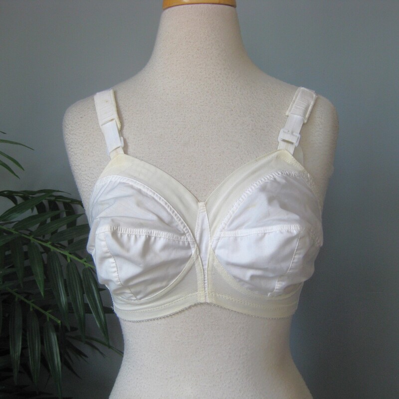 Full coverage vintage bra by Best Form
Great condition, with minor signs of uneven color
It's made of a cotton or cotton like panels and elastic connective areas which have plenty of stretch left.  it has slidable little pads on each strap.
marked size 34Dm - it's quite tight on my size 4 mannequin
two rows of hooks in the back, shown on larger setting
The band measures only 26 from end to end, stretches comfortable to about 29

thanks for looking!
#70424