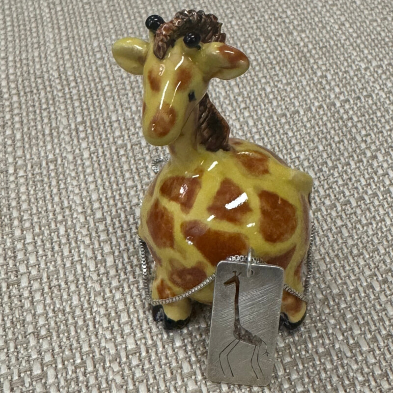 Crawsister Jewelry by Sarah Leonard<br />
.925 Adorable Giraffe Necklace<br />
Size: Pendant 1inch x 1/2 inch with 16 inch chain