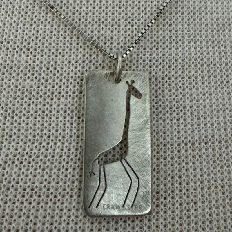 Crawsister Jewelry by Sarah Leonard<br />
.925 Adorable Giraffe Necklace<br />
Size: Pendant 1inch x 1/2 inch with 16 inch chain