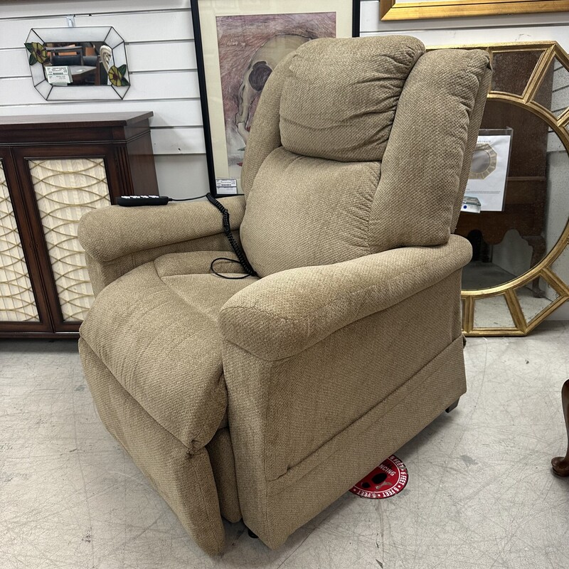 Upholstered Beige Power Recliner, only six months old. Retails for $1,900! Super comfortable.