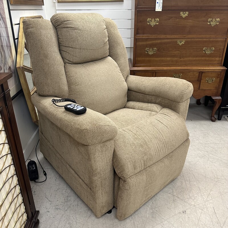 Upholstered Beige Power Recliner, only six months old. Retails for $1,900! Super comfortable.