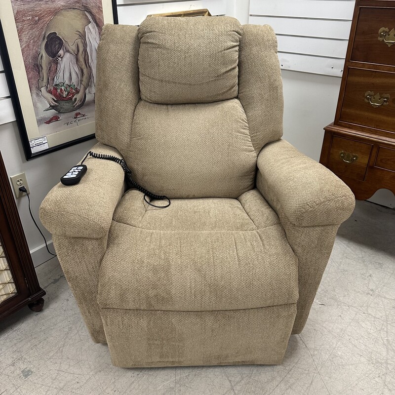 Upholstered Beige Power Recliner, only six months old. Retails for $1,900! Super comfortable.